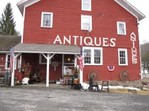 An antiques store in a large red barn