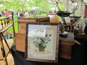  floral wall art is made with tiny beads on antique table