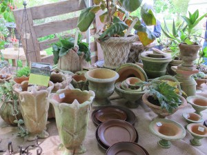 handmade mossy pots on market table